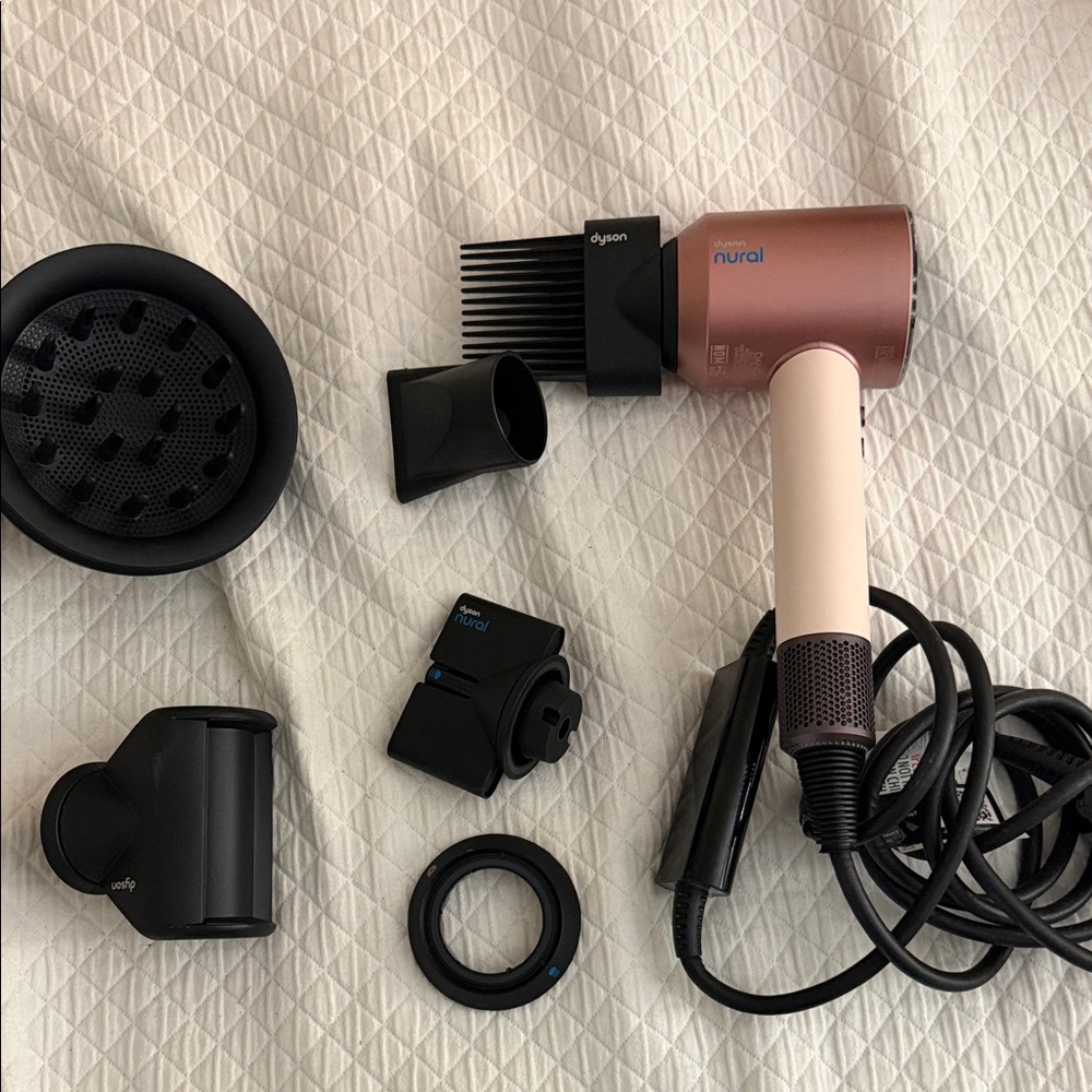 Dyson Pink and Black Nural Hair Dryer with Multiple Attachments